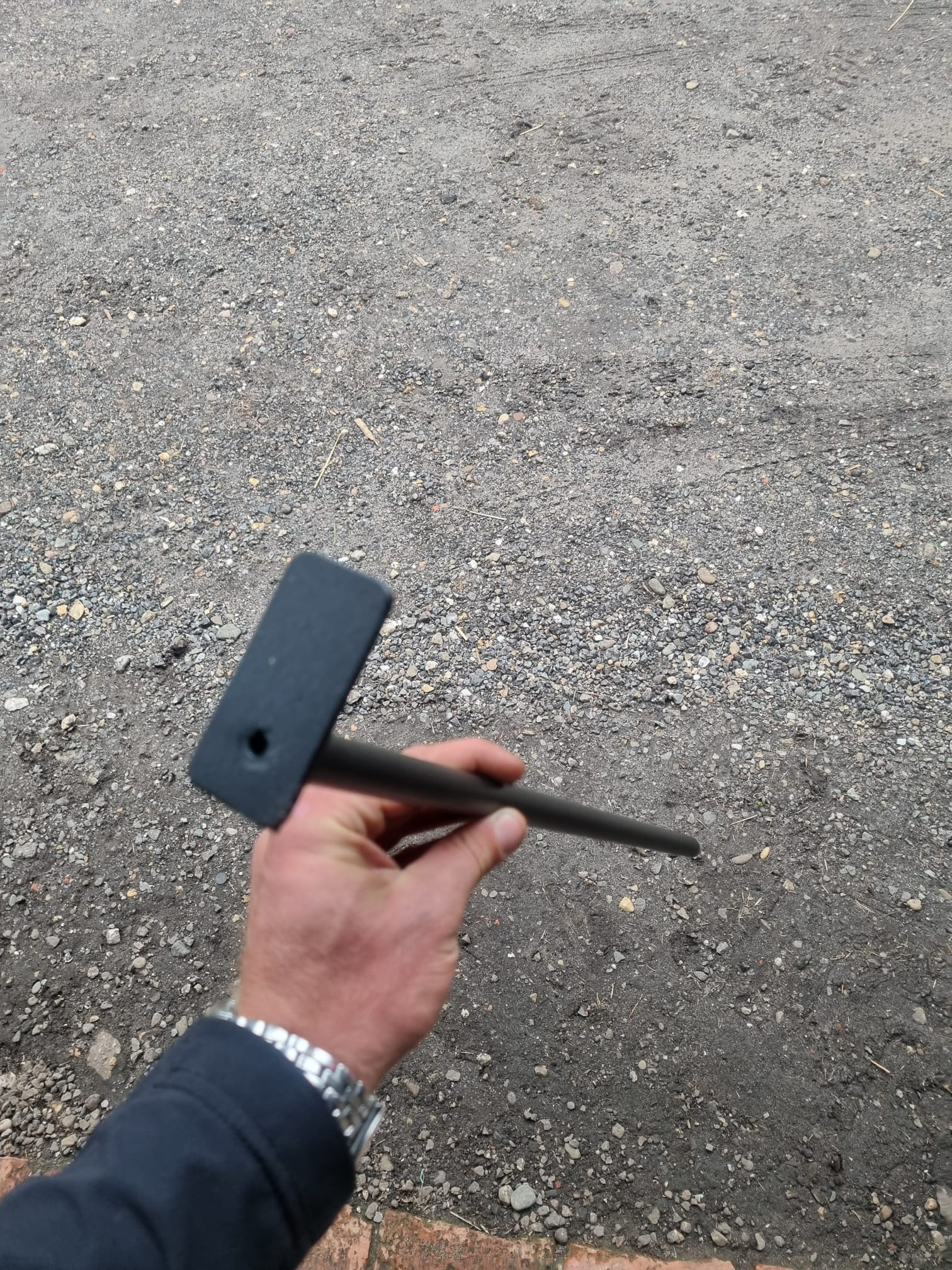 blaaspijp in de hand aan de onderkant