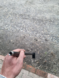 blaaspij[p aan de boven kant in een hand